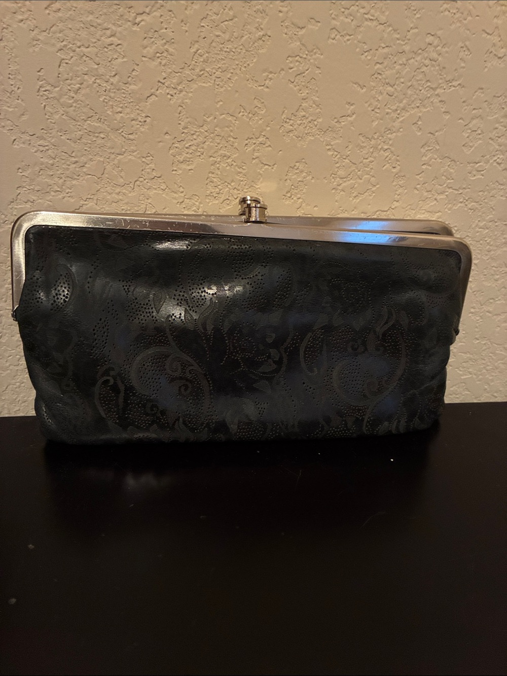 HOBO Black Floral-Embossed Leather Clutch with Silver Frame